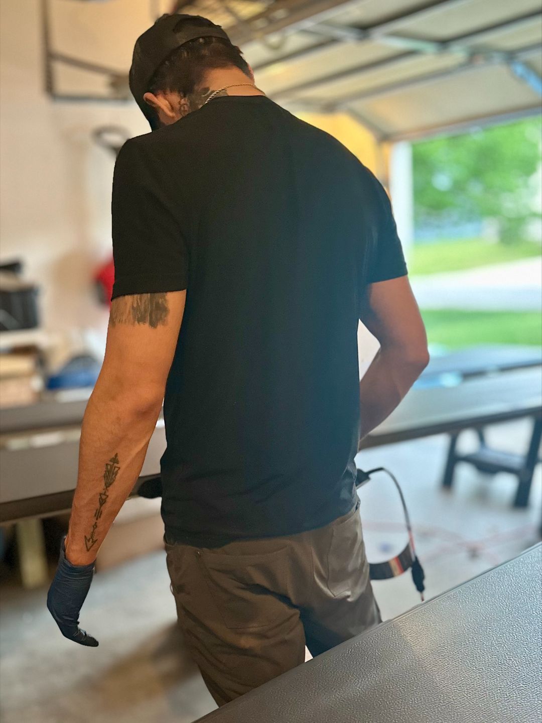 A man standing in a garage